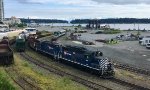 SRY 110/108 loading propane tank cars onto a barge at the Wellcox Rail Marine Ramp